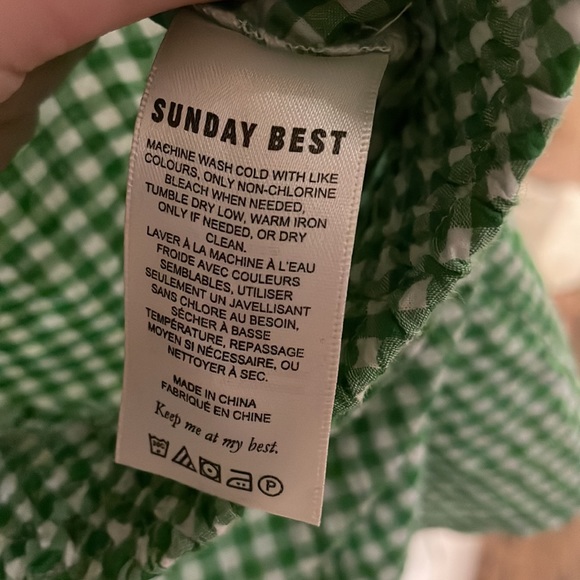 A pair of Kelly green and white gingham patterned shorts. - Picture 4 of 4